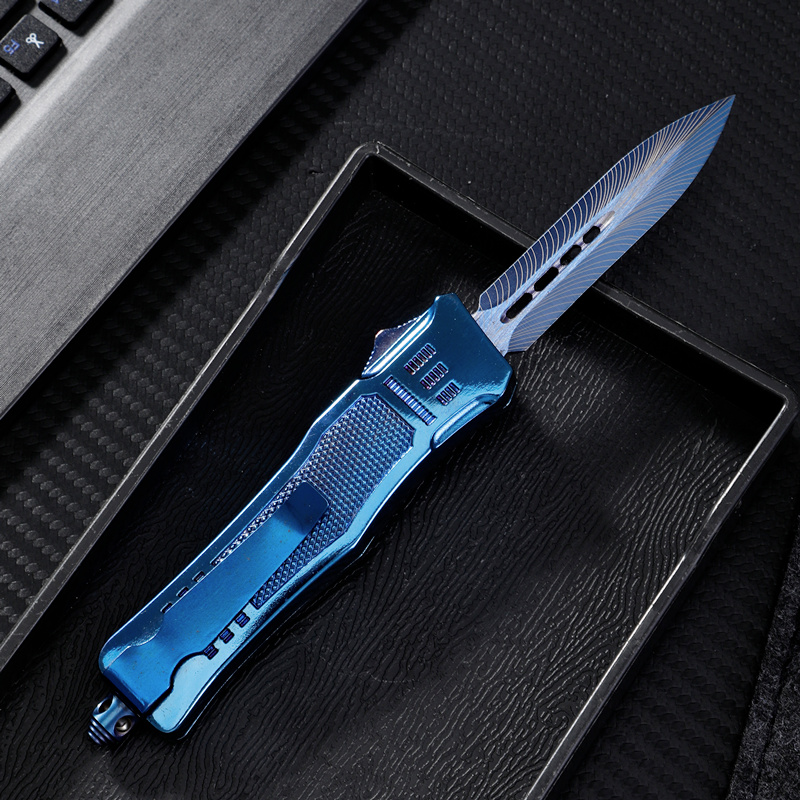 112SBLDMDP – 4.15″ Blue Titanium Dagger Blade OTF Knife